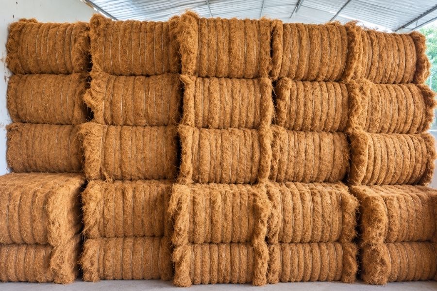 Natural coir fibre — golden brown coconut fibre texture close-up